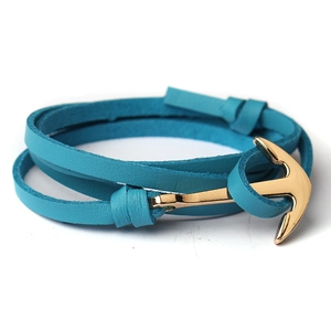 Multilayer turquoise leather wrap bracelet with a gold-tone metal anchor clasp