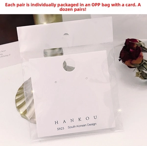 Detail of the jewelry packaging with S925 sterling silver ear studs card and OPP bag