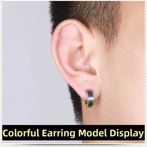 Close-up of rainbow titanium steel clip-on earring for non-pierced ears worn by model