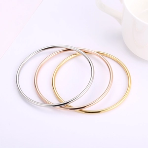 Minimalist 3mm titanium steel bracelets in silver, gold, and rose gold stacked set