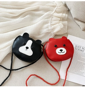 Detail view of cute PU leather cartoon animal crossbody bags with woven rope straps