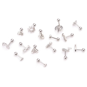 Close-up of 14 surgical steel ear studs with zircon heart bow and screw ball back