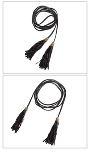 Detail view of deep brown PU braided waist chain featuring antique bronze metal tassels