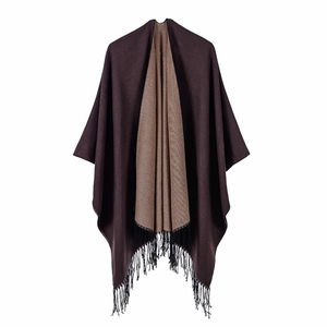 Detailed close-up of double-sided solid shawl with brown fringe and dual-tone finish