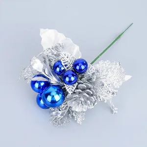 Artificial Christmas branch with blue baubles, glitter leaves and silver pine cones decoration