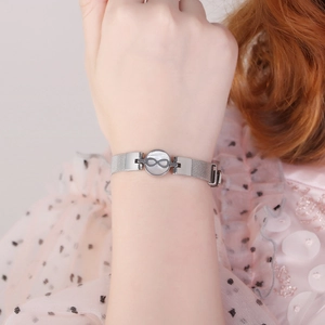 Silver Milanese mesh bracelet with infinity pendant and adjustable watch strap buckle