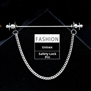 Detail of silver shirt collar pin with hanging metal chains and secure ball clasps