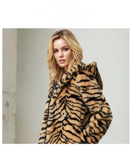 Close-up of tiger print faux fur coat featuring a plush hood and textured patterns
