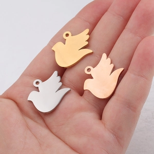 Mirror polished stainless steel dove pendants in gold, silver and rose gold finishes