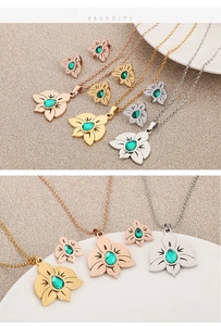 Floral jewelry set featuring green teardrop zircon necklace and matching stud earrings
