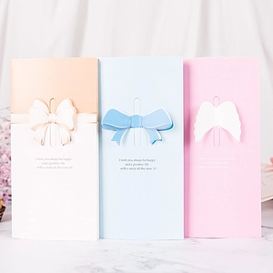 3D butterfly and bow greeting cards in pastel pink, blue, and orange with elegant envelopes