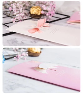 Detailed view of 3D butterfly and bow greeting cards with elegant gold English text