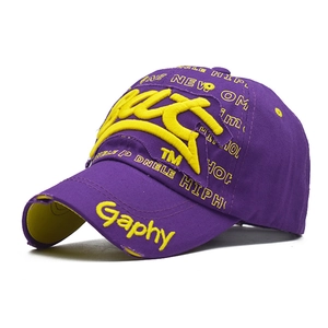 Close-up of vintage purple baseball cap with yellow 3D embroidery and distressed ripped brim
