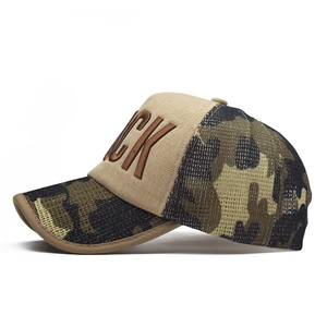 Detail of 3D embroidered CK logo on camouflage and khaki cotton baseball cap