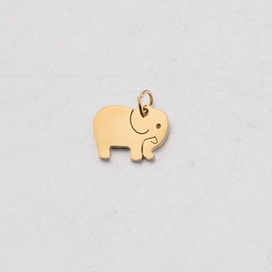 Macro view of a gold elephant-shaped polished stainless steel DIY jewelry charm