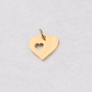 Detailed close-up of a polished gold-plated stainless steel double heart pendant for jewelry