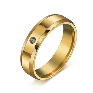 Classic 8mm gold stainless steel ring with a single center-set sparkling stone
