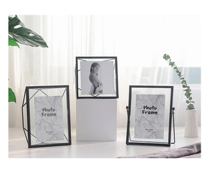 Three minimalist black metal and glass photo frames in 4x6 size for modern home decor