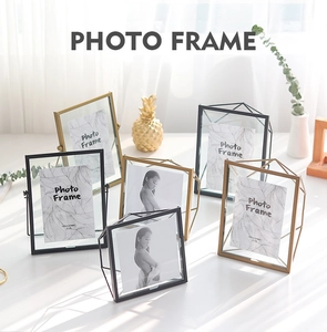 Detail of 4x6 inch Nordic geometric gold metal photo frame in a minimalist home setting