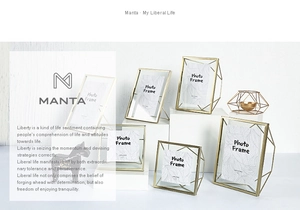 Close-up of geometric gold metal photo frames with glass panels in various sizes