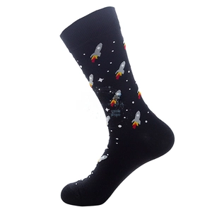 Detail of black crew socks with cartoon rocket and white star pattern in soft knit cotton