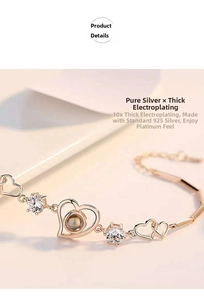 Detail of rose gold 925 silver heart bracelet with sparkling white cubic zirconia