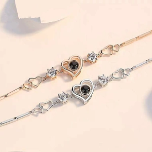 Fashionable heart projection bracelets in rose gold and silver with cubic zirconia