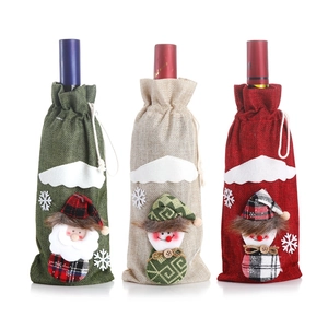 Christmas wine bottle covers with Santa and Snowman designs for holiday table decor