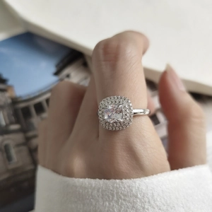 Minimalist 925 sterling silver ring featuring a radiant square halo zircon on a model hand
