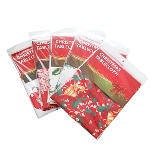 Five-pack of festive Christmas tablecloths with vibrant red and green holiday prints