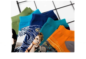 Detailed close-up of low-cut cotton socks featuring famous art oil painting prints