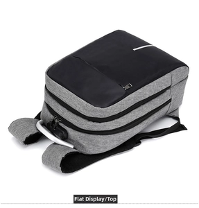 Top view of business laptop backpack with grey textured fabric and silver top handle