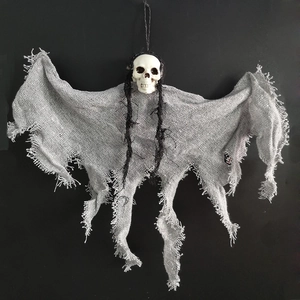 Detail of Halloween hanging skull ghost with grey tattered fabric for haunted house decor