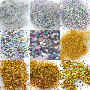 Macro detail of aurora laser nail glitter sequins in assorted hexagonal shapes and sizes