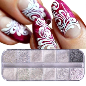 Macro shot of 12-color nail glitter set in a box with red floral 3D nail art design