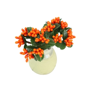 Artificial orange berry plant in white ceramic vase for home and wedding table decor