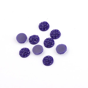 Macro view of 8mm deep purple druzy resin rhinestones with flat back and sparkle texture