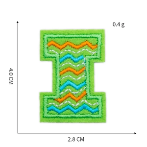 Detailed view of green letter I embroidery patch with zigzag lines, size 4.0 x 2.8 cm