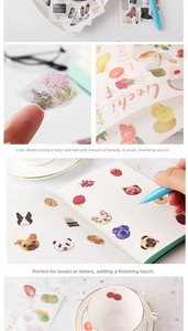 Detailed macro view of semi-transparent aesthetic stickers showing fruits and cute pets patterns