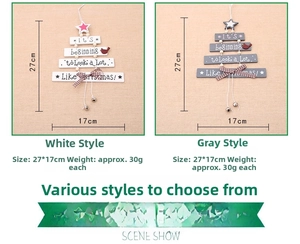 Detailed view of wooden Christmas tree wall hanging with star and metal bell