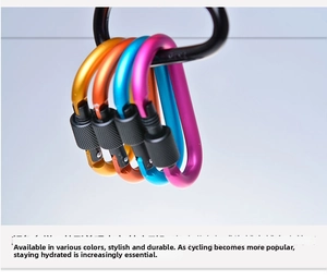 Close-up of colorful D-ring locking carabiners with secure screw gates for outdoor gear