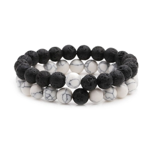 Lava stone and white turquoise beaded bracelets for couples on white background