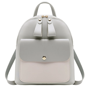 Grey and pink contrast PU leather mini backpack with dual gold zippers and tassel detail