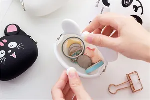 Close-up of animal silicone coin purse showing open metal clasp and interior storage space