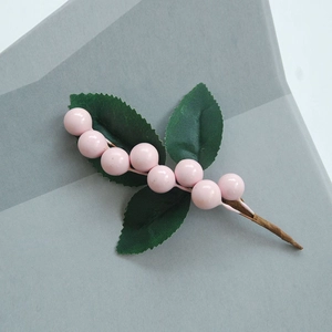 Artificial pink berry stem with green leaves and brown branch for home DIY decor