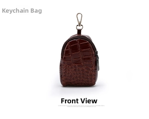Detail shot of mini dark brown crocodile pattern key pouch with gold metal hook