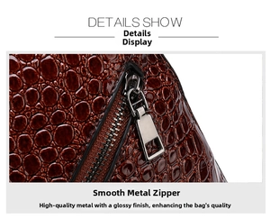 Close-up of brown crocodile pattern leather with smooth silver metal zipper detail