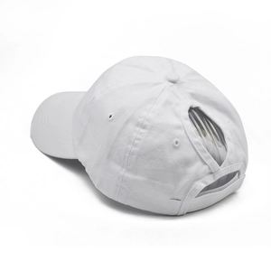 Detail of white cotton ponytail baseball cap featuring a unique criss-cross elastic back