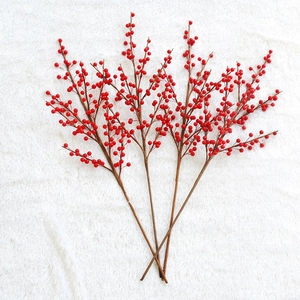 Vibrant red faux holly berry stems for festive New Year and Christmas home floral decor