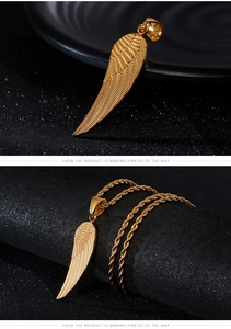 Detailed view of golden angel wing pendant with intricate feather texture on twisted chain